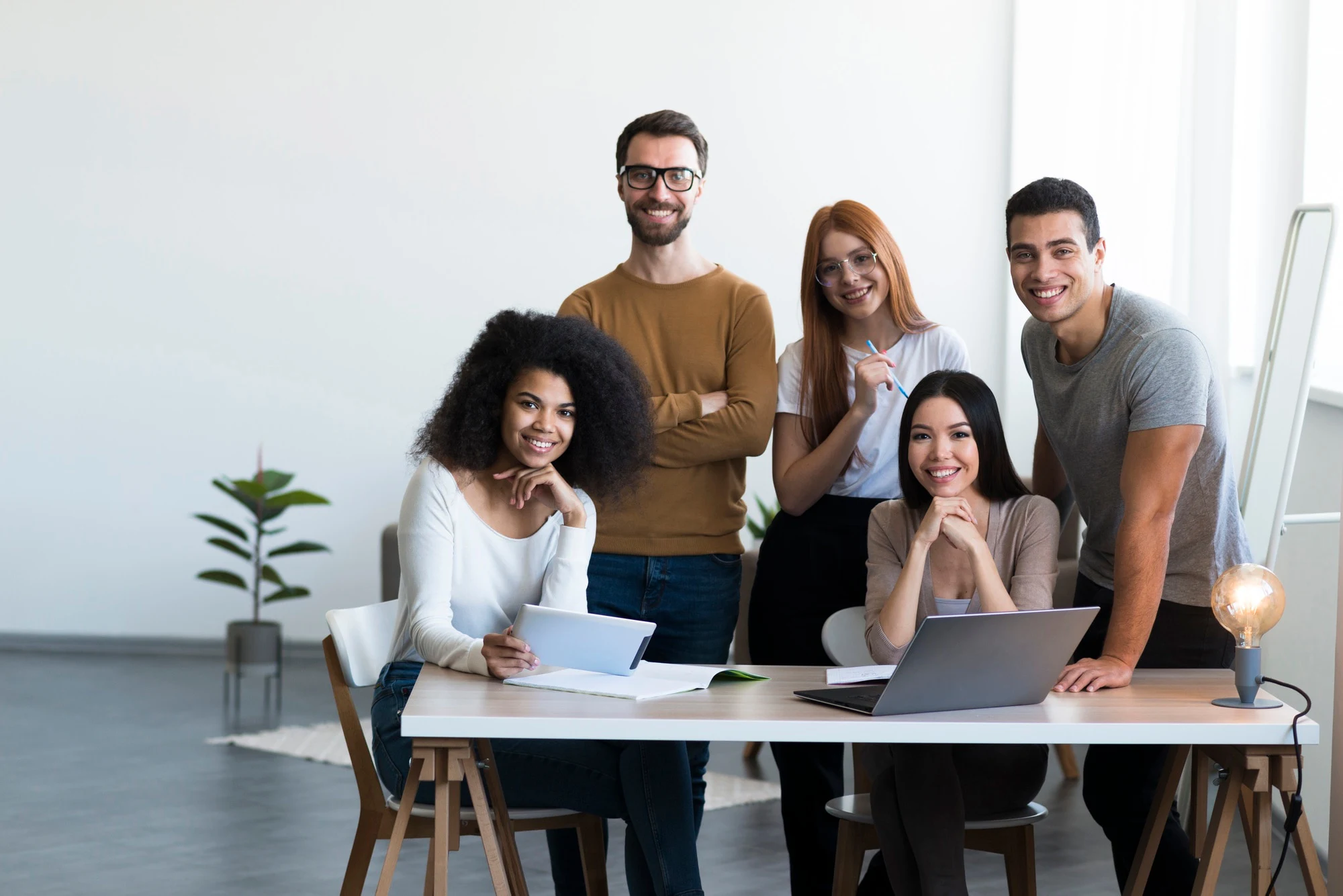 group-positive-young-people-posing-together_23-214